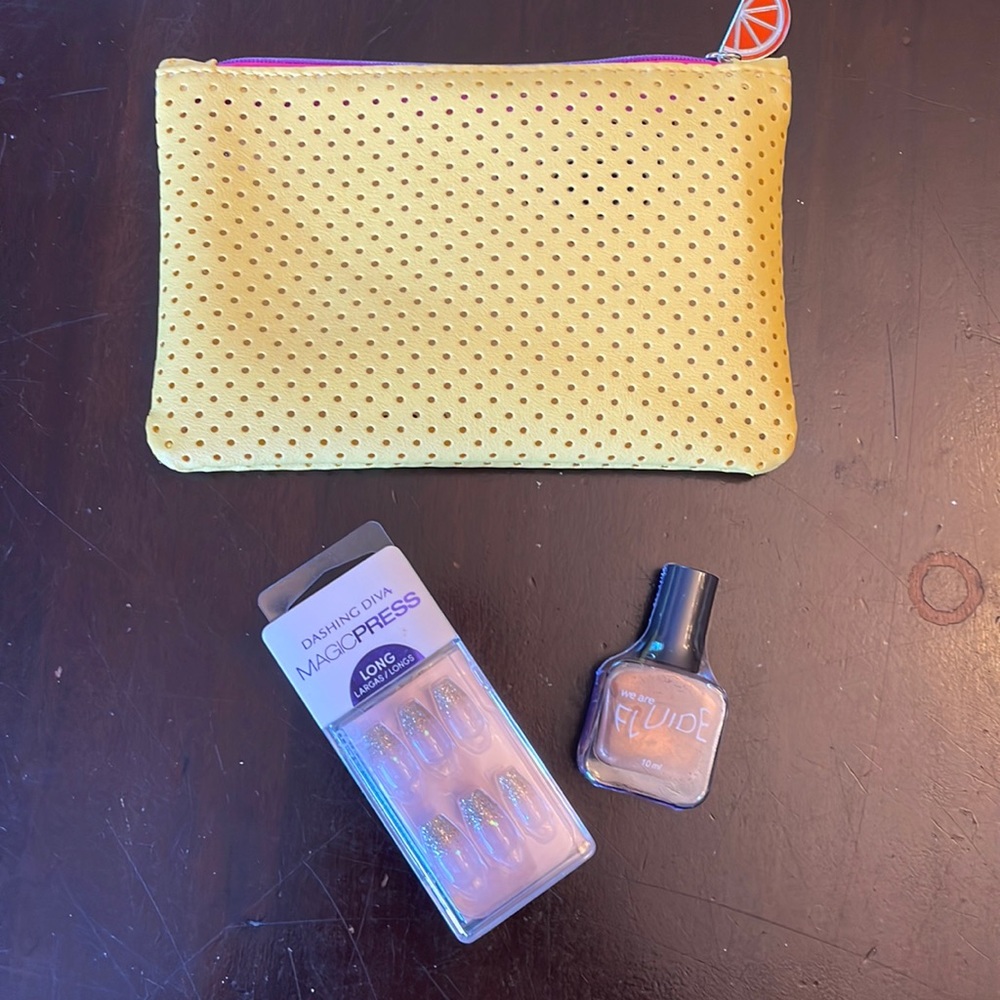Ipsy make up bag with mail bundle.